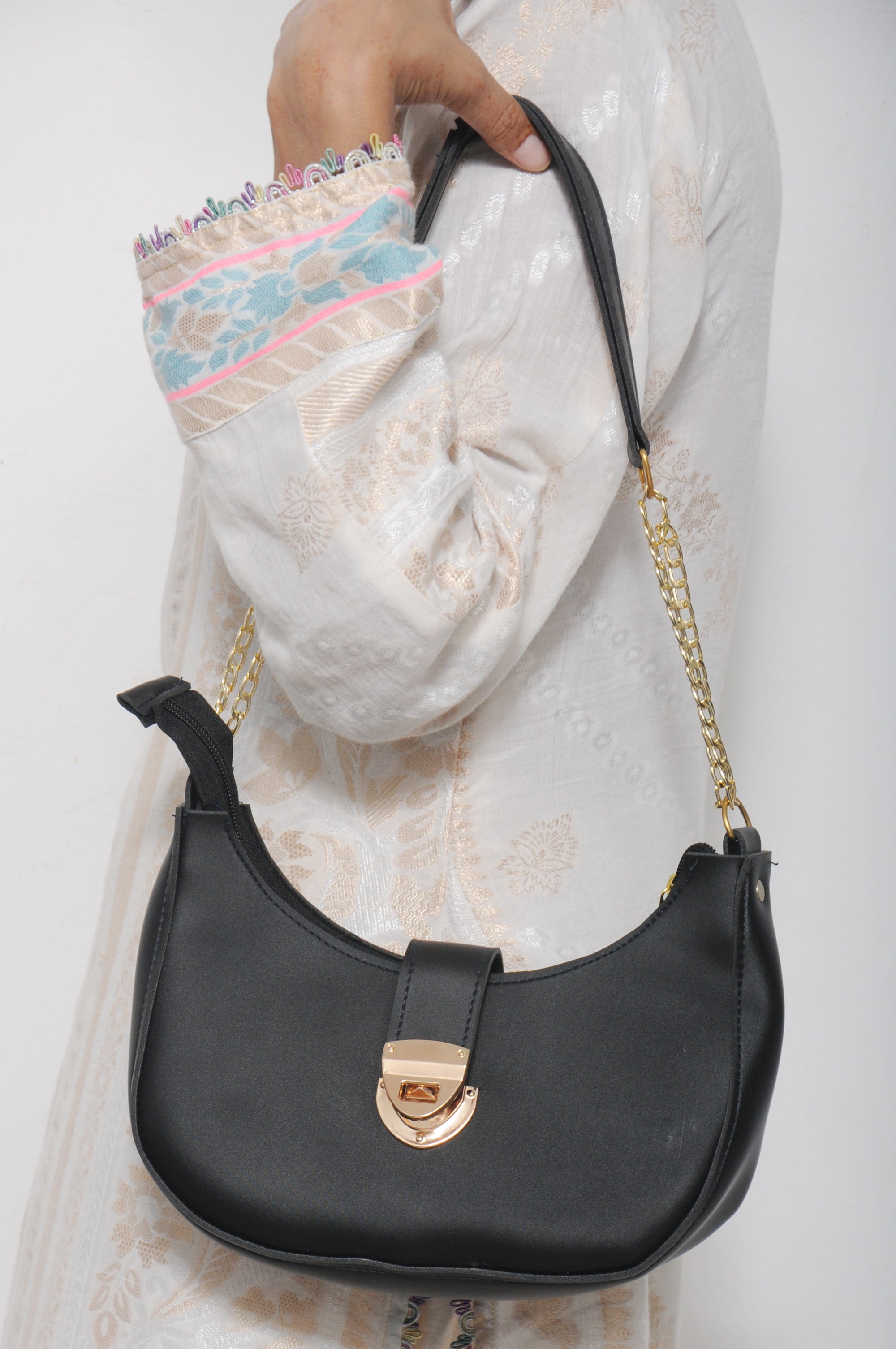 Black Crescent Shoulder Bag with Gold Chain & Clasp Detail
