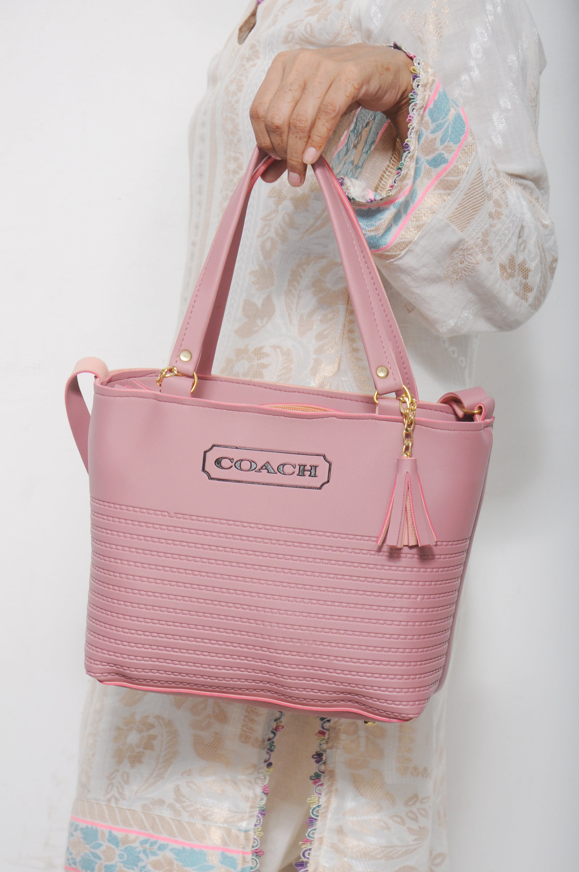 Textured Tea Pink Tote Bag with Tassel Charm & Crossbody Strap