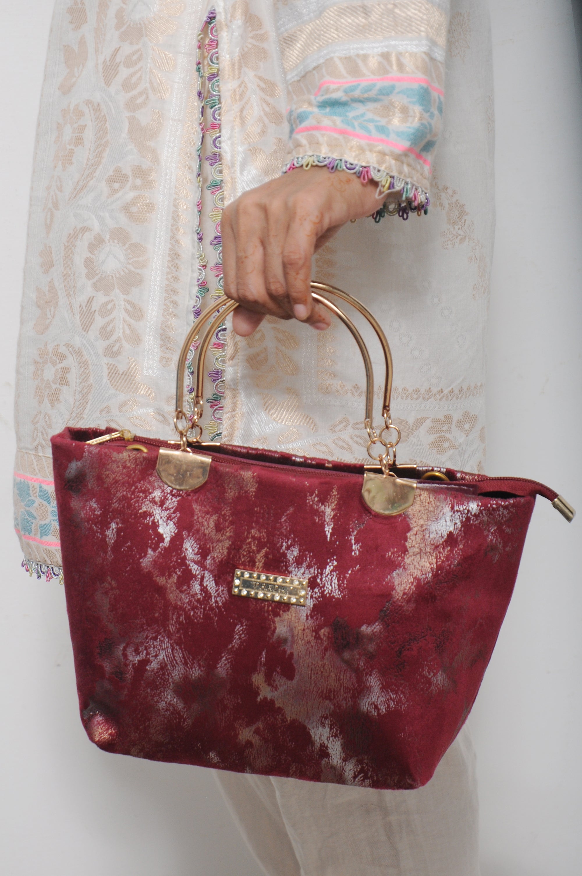 Metallic Maroon Velvet Top-Handle Pouch with Crystal Emblem